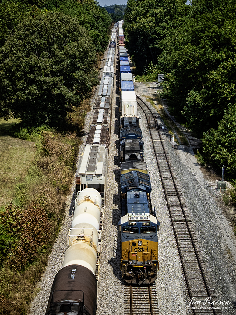 CSX I025 heads south from Robards, Kentucky on August 16th, 2025, on the CSX Henderson Subdivision, as they pass northbound M502.

Tech Info: DJI Mavic 3 Classic Drone, RAW, 22mm, f/2.8, 1/2000, ISO 100.

#railroad #railroads #train, #trains #railway #railway #steamtrains #railtransport #railroadengines #picturesoftrains #picturesofrailways #besttrainphotograph #bestphoto #photographyoftrains #bestsoldpicture #JimPearsonPhotography #trainsfromtheair #trainsfromadrone #onecsx #csx