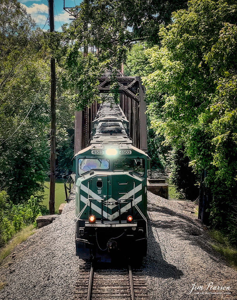 Paducah and Louisville Railway 4503 and 4521 lead a loaded Louisville, Gas and Electric coal train north across the drawbridge at Rockport, Kentucky, on August 26th, 2025. 

According to Wikipedia: The Paducah & Louisville Railway (reporting mark PAL) is a Class II railroad that operates freight service between Paducah and Louisville, Kentucky. The line is located entirely within the Commonwealth of Kentucky.

The 270-mile (430 km) line was purchased from Illinois Central Gulf Railroad in August of 1986.

Tech Info: 4K Frame Grab from a DJI Mavic 3 Classic Drone.

#railroad #railroads #train, #trains #railway #railway #steamtrains #railtransport #railroadengines #picturesoftrains #picturesofrailways #besttrainphotograph #bestphoto #photographyoftrains #bestsoldpicture #JimPearsonPhotography #trainsfromtheair #trainsfromadrone #paducahandlouisvillerailway