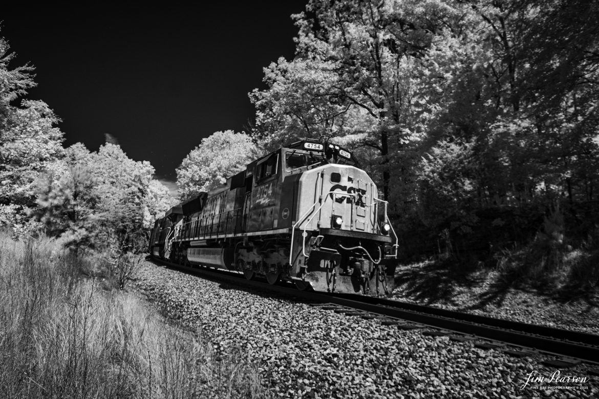 In this week’s Saturday Infrared photo, we catch CSX loaded coal train C015 passing through the location known as Sand Cut as they head south, just north of Crofton, Ky, on the CSX Henderson Subdivision, on September 1st, 2025.

Tech Info: Fuji XT-1, RAW, Converted to 720nm B&W IR, Nikon 10-24 @ 15mm, f/4.5, 1/500, ISO 200.

#trainphotography #railroadphotography #trains #railways #jimpearsonphotography #infraredtrainphotography #infraredphotography #trainphotographer #railroadphotographer #infaredtrainphotography #trending