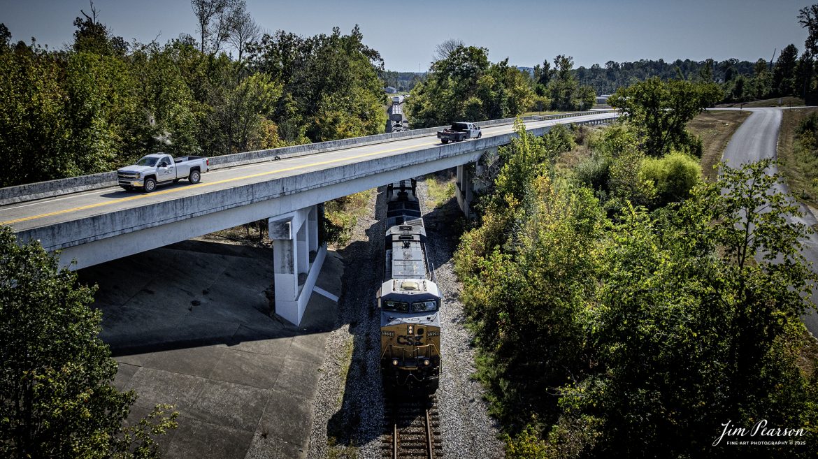 The CSX daily local, L391, which runs between Casky Yard at Hopkinsville and Atkinson Yard in Madisonville, Kentucky passes under the US 41 overpass at Barnsley, Ky, on September 18th, 2025, as it heads north on the CSX Henderson Subdivision.

Tech Info: DJI Mavic 3 Classic Drone, RAW, 22mm, f/2.8, 1/4000, ISO 250

#railroad #railroads #train, #trains #railway #railway #railtransport #railroadengines #picturesoftrains #picturesofrailways #besttrainphotograph #bestphoto #photographyoftrains #bestsoldpicture #JimPearsonPhotography #trainsfromtheair #trainsfromadrone #onecsx #csx