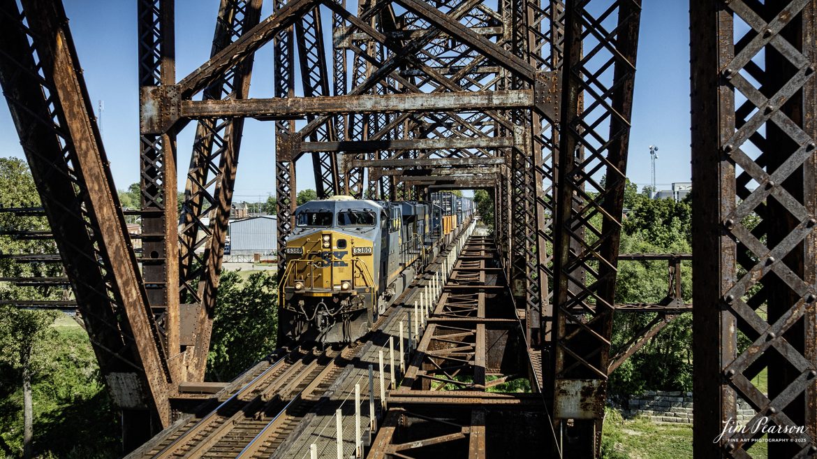 CSXT 5380 leads intermodal I128 north across the bridge over the Ohio River at Henderson, Kentucky on September 8th, 2025, on the CSX Henderson Subdivision.

Tech Info: DJI Mavic 3 Classic Drone, RAW, 22mm, f/2.8, 1/1250, ISO 110

#railroad #railroads #train, #trains #railway #railway #railtransport #railroadengines #picturesoftrains #picturesofrailways #besttrainphotograph #bestphoto #photographyoftrains #bestsoldpicture #JimPearsonPhotography #trainsfromtheair #trainsfromadrone #onecsx #csx