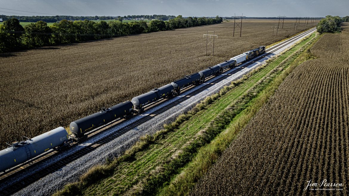 CSXT 7500 and 3272 lead empty ethanol train B796 northbound past fields of corn ready for harvest and into the siding, at Rankin, Kentucky on September 30th, 2025, on the CSX Henderson Subdivision. This train runs between Tampa, FL and Linden, IN.

Tech Info: DJI Mavic 3 Classic Drone, RAW, 22mm, f/2.8, 1/1600, ISO 160

#railroad #railroads #train, #trains #railway #railway #railtransport #railroadengines #picturesoftrains #picturesofrailways #besttrainphotograph #bestphoto #photographyoftrains #bestsoldpicture #JimPearsonPhotography #trainsfromtheair #trainsfromadrone #onecsx #csx